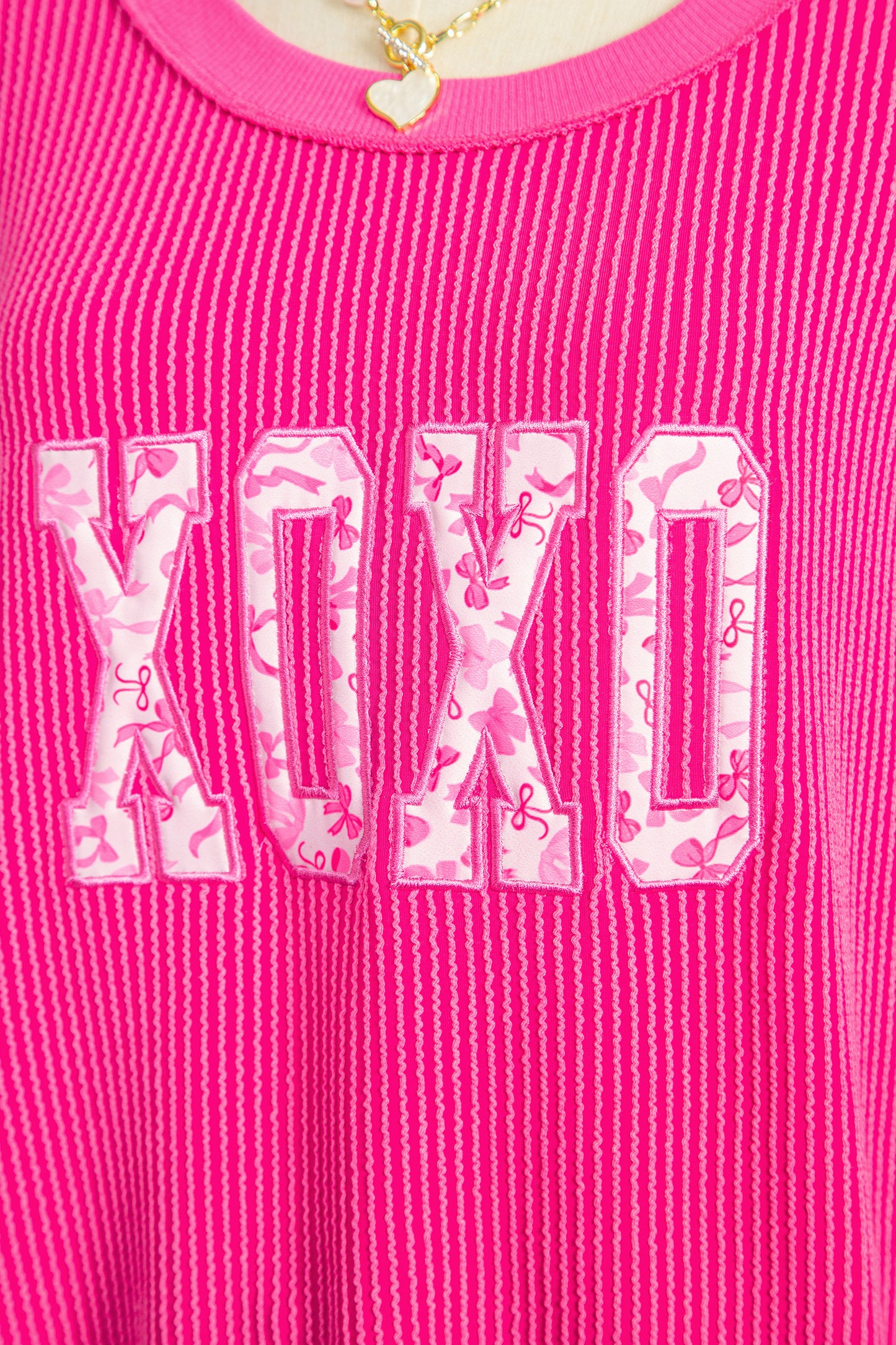 Strawberry Pink Twisted Ribbed Long Sleeve XOXO Bow Print Embroidered Patch Graphic Top